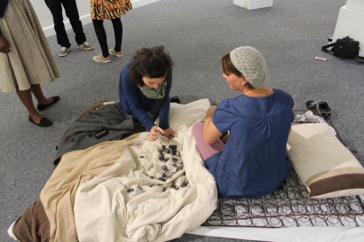 2015, "Archived Memories', National Art Gallery of Namibia, Windhoek, Namibia. This is a live, interactive performance art piece. There are 169 personal memories about beds and mattresses that I recorded as a catalogue. I made corresponding tags from clay and recorded the 169 numbers from the catalogue on them. The audience was allowed to chose a memory tag and I would read the corresponding memory in the catalogue to them. Memories included: childhood memories until current.